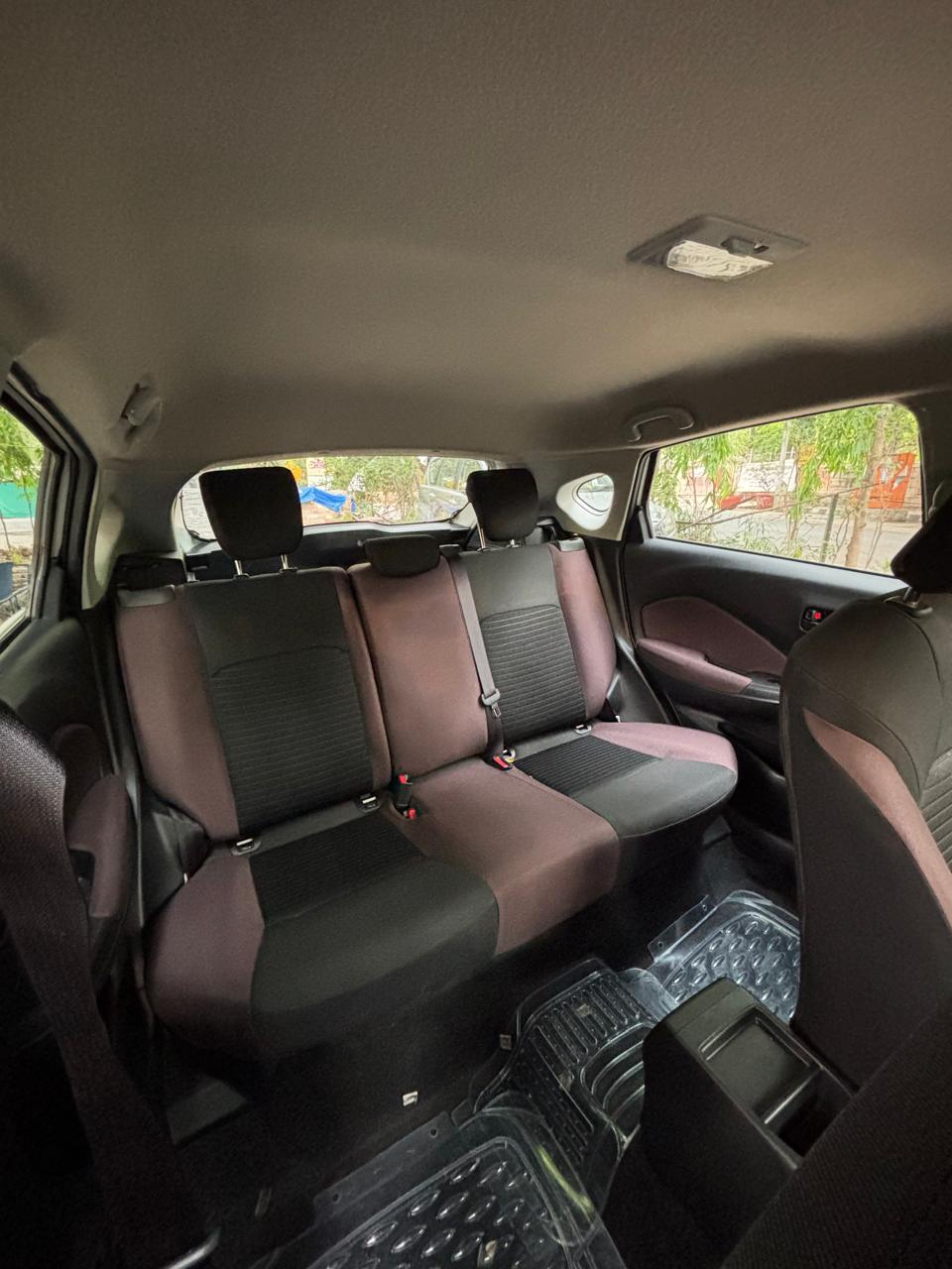Rear passenger seats in a compact vehicle