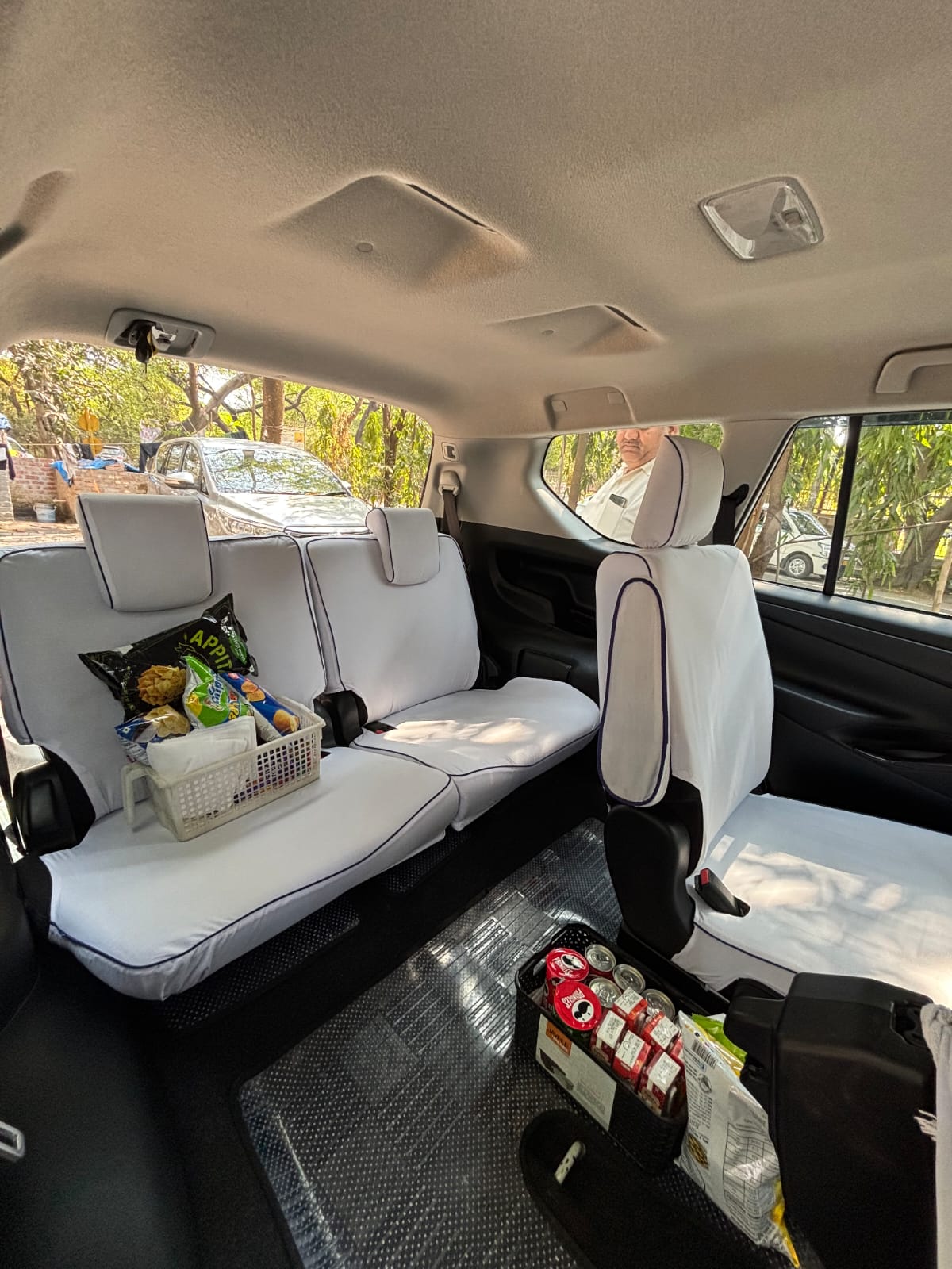 Rear seats inside a group travel vehicle